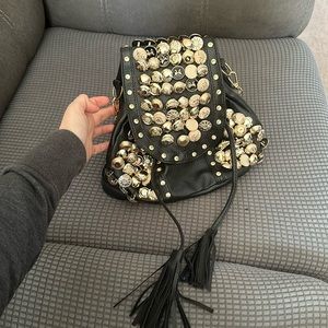 Mini black studded backpack